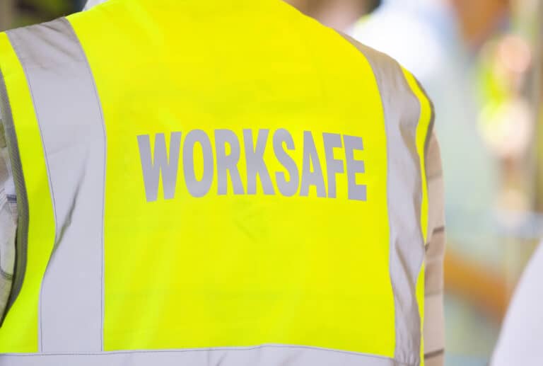 WorkSafe inspector wearing high visibility jacket.